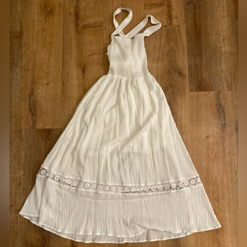 White, long dress. Slightly open back with tie. Size small, No tags